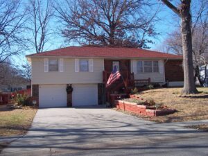 Cottage red roofing project by Bill West Roofing in Kansas City