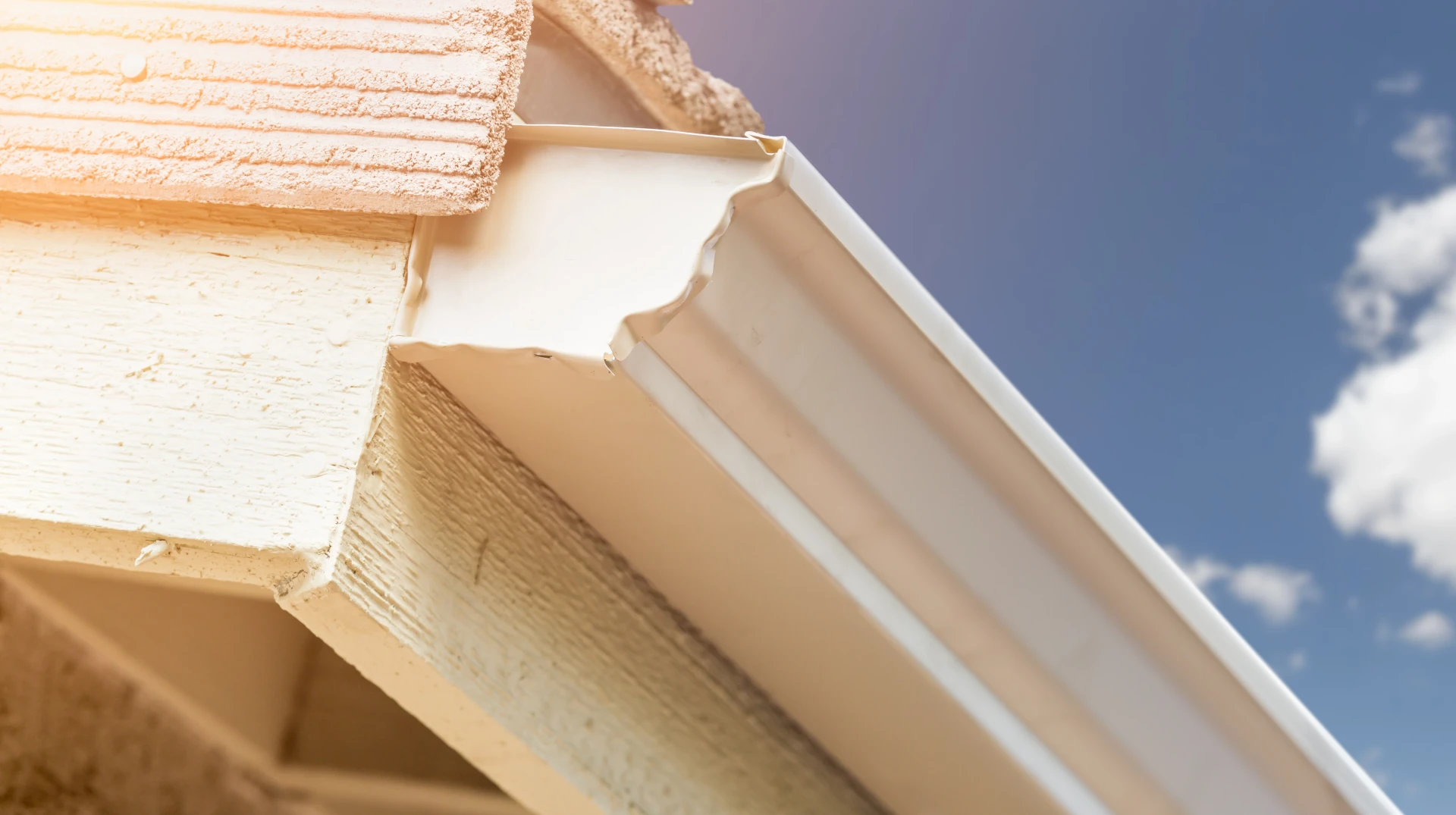 A house with new seamless aluminum gutters.